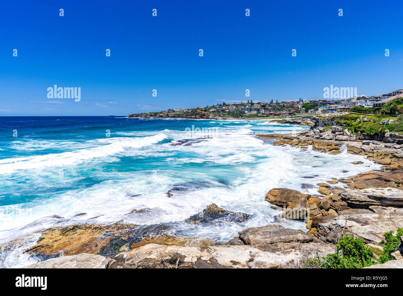 The classic Sydney Coastal walk from Bondi Beach to Coogee Beach is a favourite among locals and tourists. Stock Photo