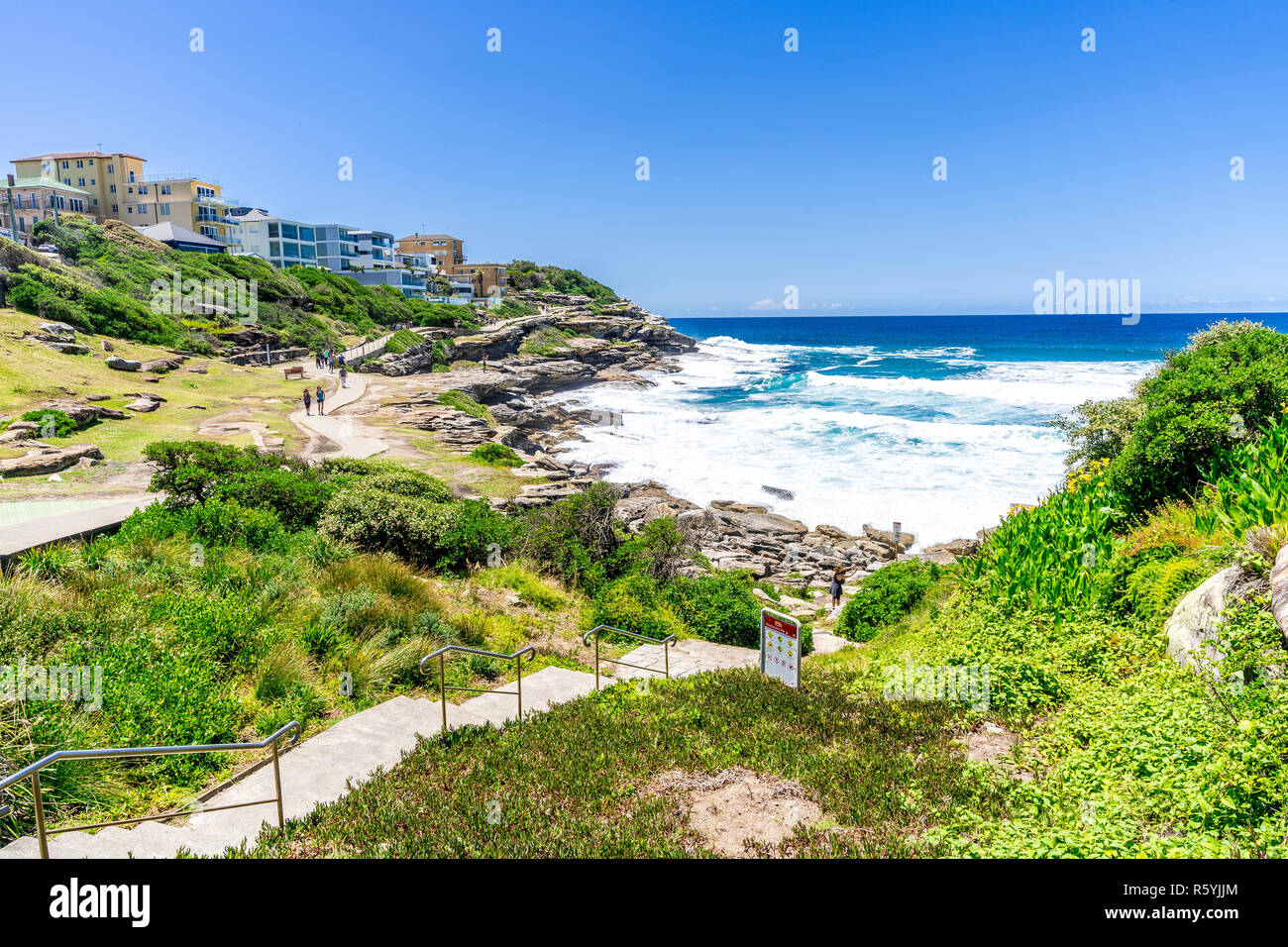 The classic Sydney Coastal walk from Bondi Beach to Coogee Beach is a favourite among locals and tourists. Stock Photo