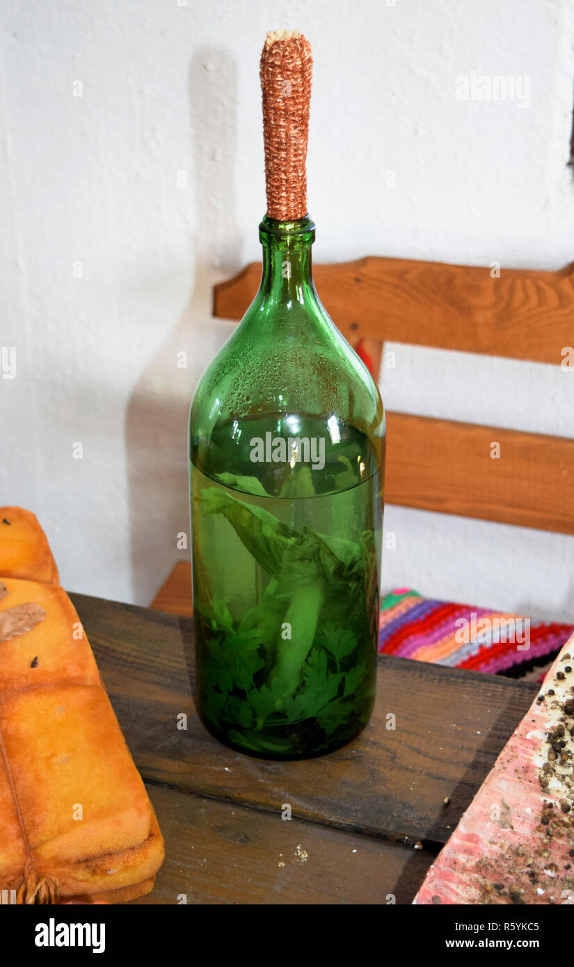 Tincture of horseradish and parsley on moonshine. A bottle of li Stock