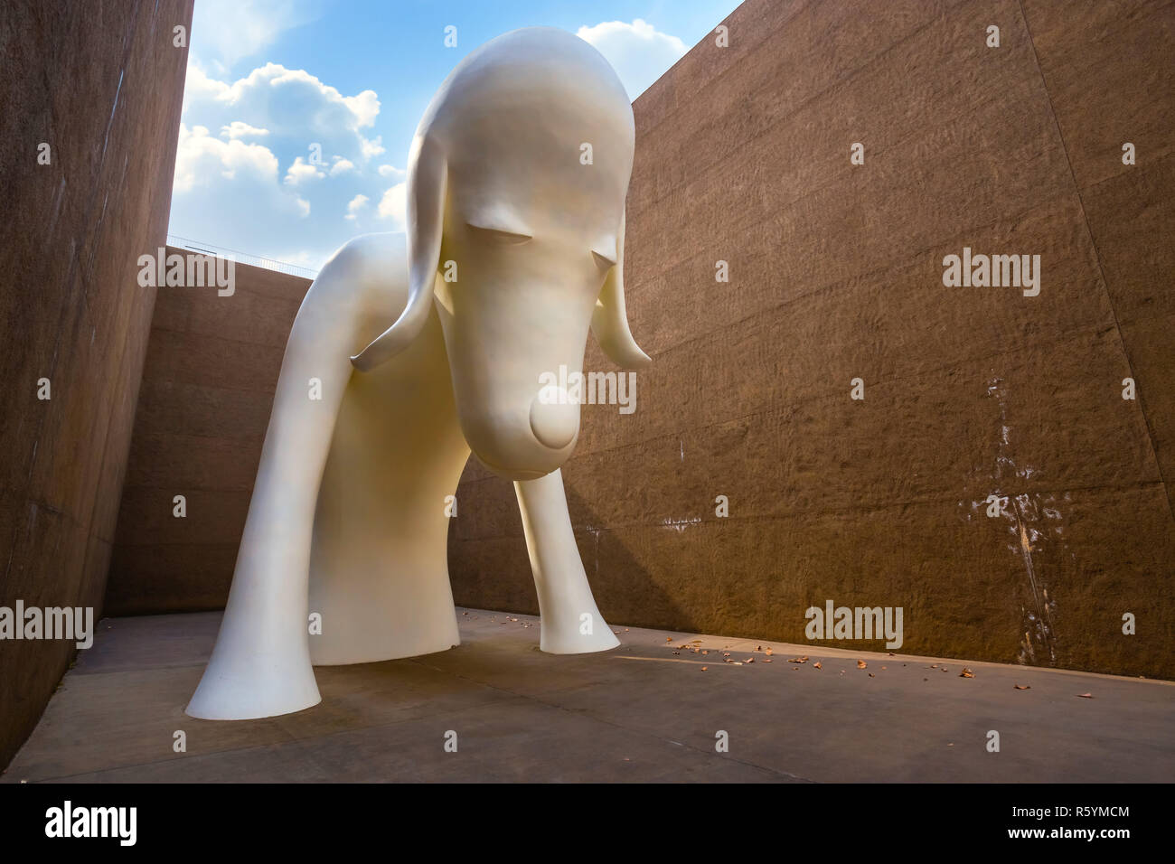 Tokyo, Japan - April 22 2018:  Aomori Dog Statue a gigantic white dog over 8.5 meters tall at The Aomori Museum Stock Photo
