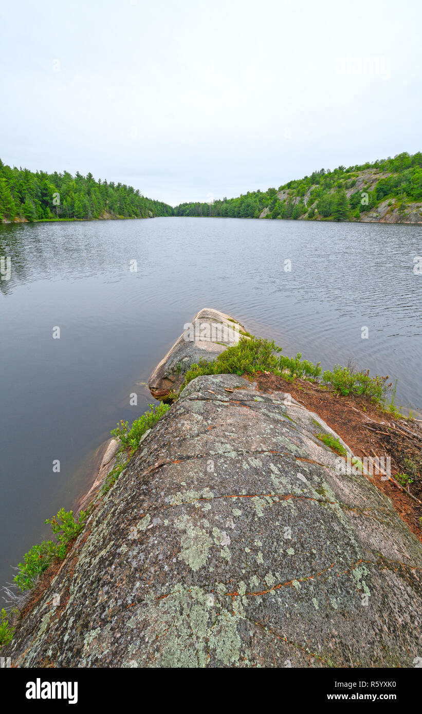Barren point on a remote lake Stock Photo