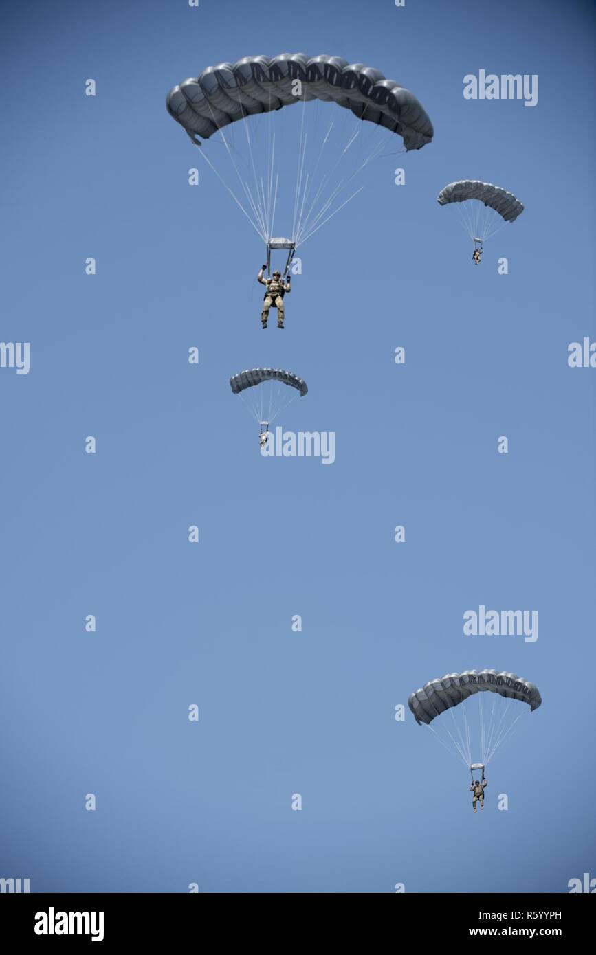 U.S. Air Force Airmen and U.S. Army Soldiers conduct parachute training ...