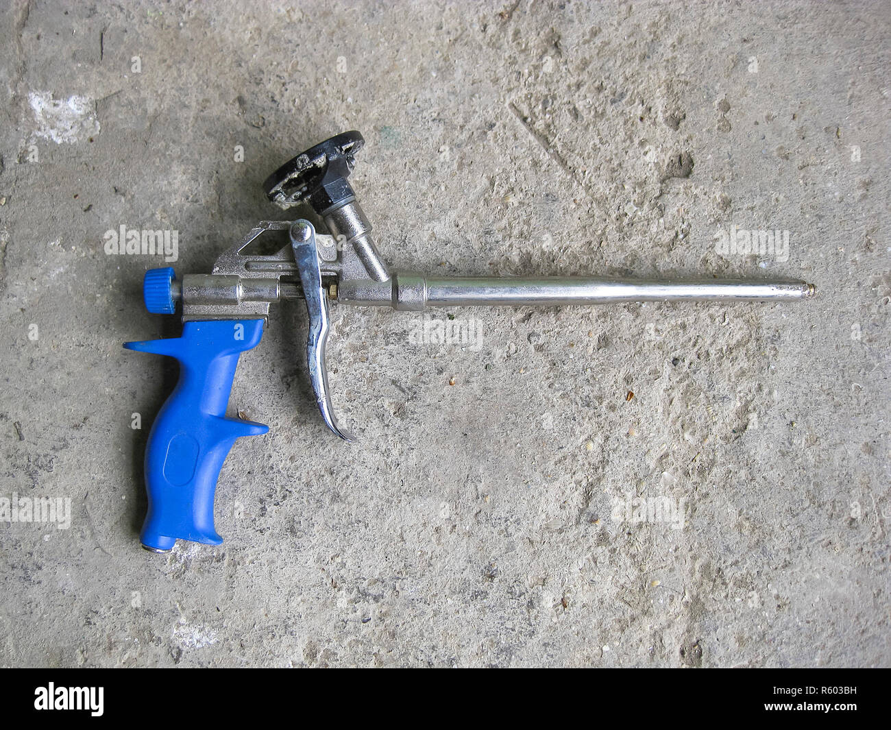 Gun foam. Pistol for adhesive foam Stock Photo Alamy