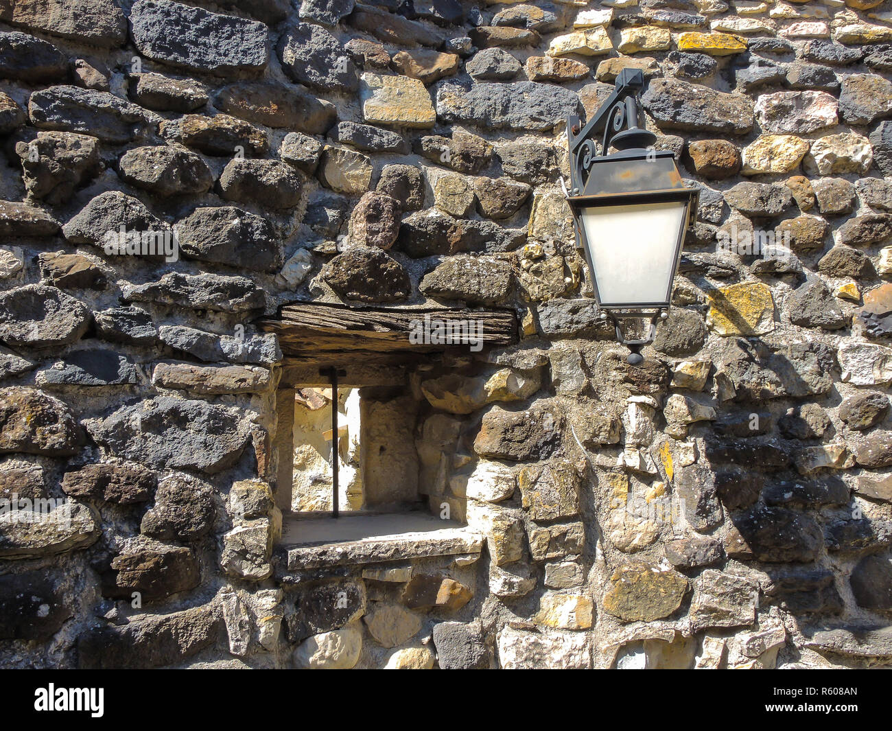 wooden window in the stone wall Stock Photo - Alamy