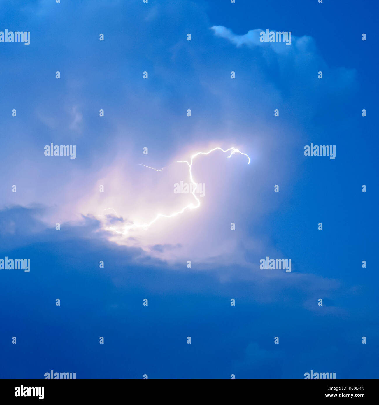 Lightnings in storm clouds. Peals of a thunder and the sparkling Stock ...