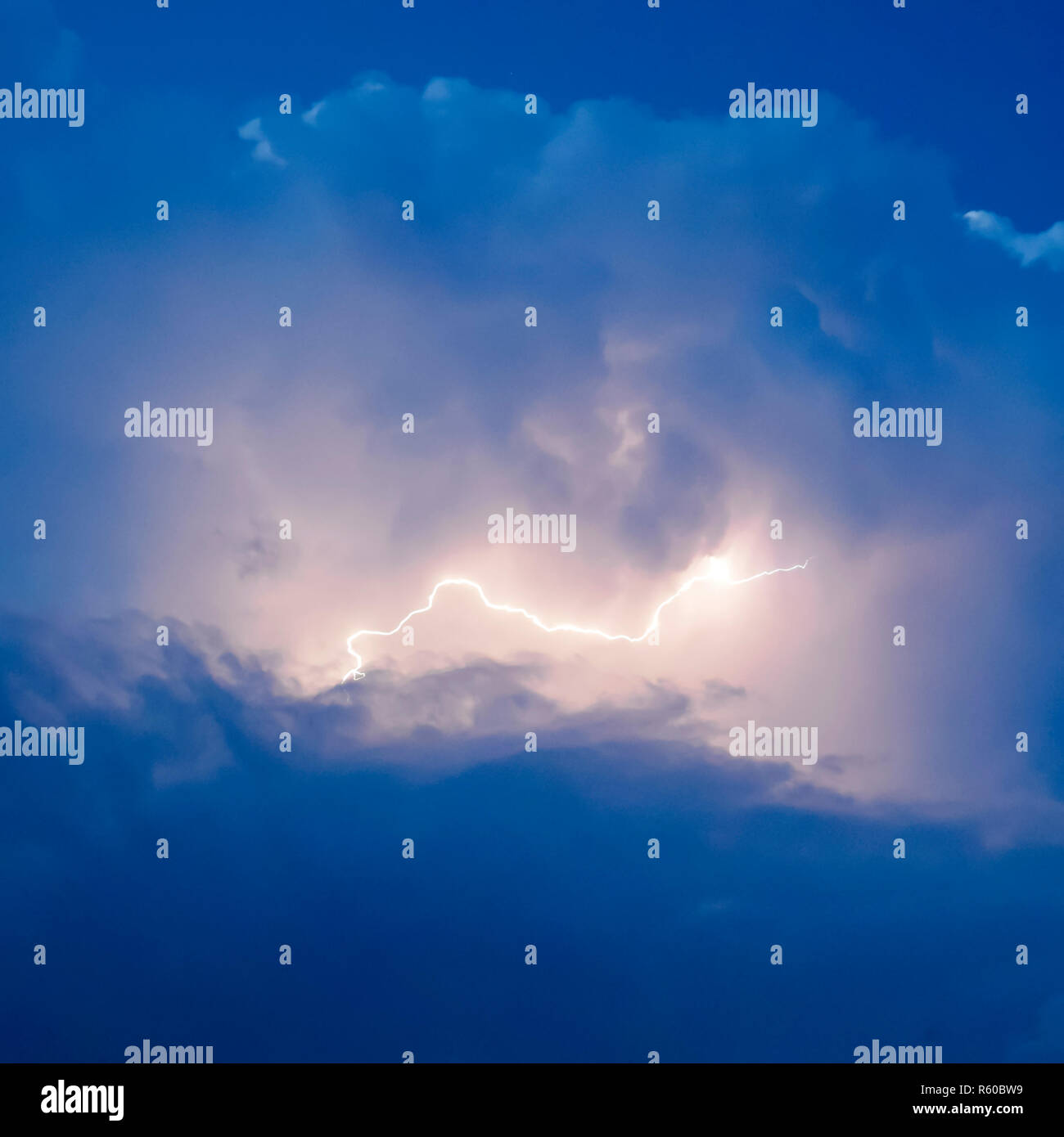 Lightnings in storm clouds. Peals of a thunder and the sparkling Stock ...
