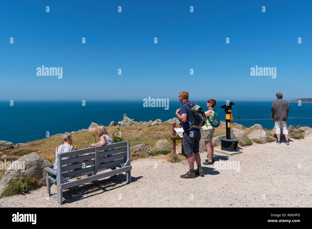 tourists visitors admiring the view at lands end cornwall, england, britain, uk. Stock Photo