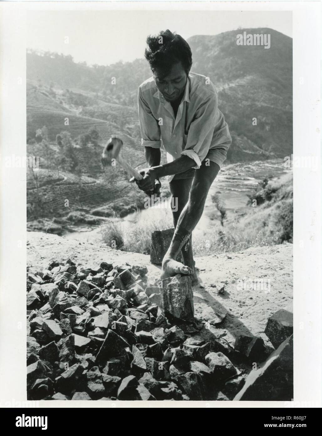 Three Men Breaking Rocks SRI Lanka - Micellaneous photos - Man breaking rocks Stock Photo - Alamy