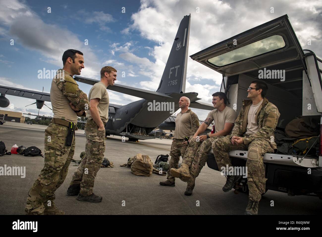 Senior Airman Matt, left, 38th Rescue Squadron pararescueman, laughs ...