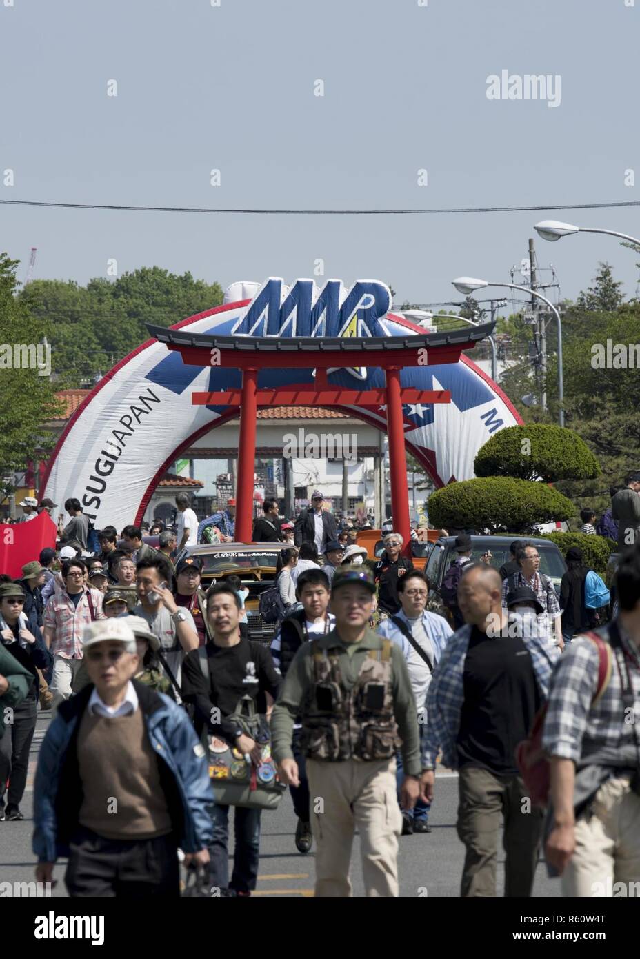 NAVAL AIR FACILITY ATSUGI, Japan (April 29, 2017) Visitors pass through the entrance to Naval Air Facility (NAF) Atsugi’s annual Spring Fest event. The open base festival draws crowds in excess of 65,000 visitors each year. NAF Atsugi has hosted open base community friendship events for nearly 30 years as a means to build closer ties and understanding to the communities around the base and all over Japan. Stock Photo