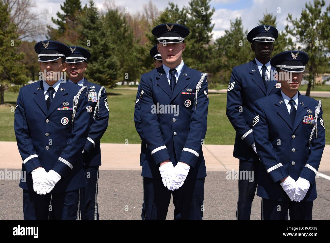 Mile High Honor Guard ceremonial guardsmen stand in formation moments ...