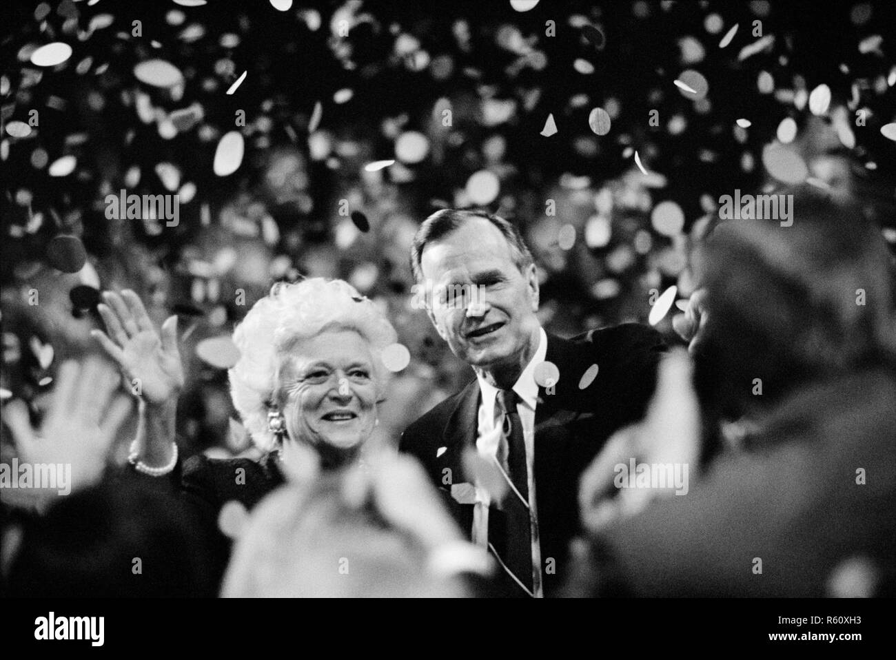 Presidential nominee George H.W. Bush and wife Barbara Bush wave to crowd at the 1992 Republican National Convention in Houston, Texas. Stock Photo