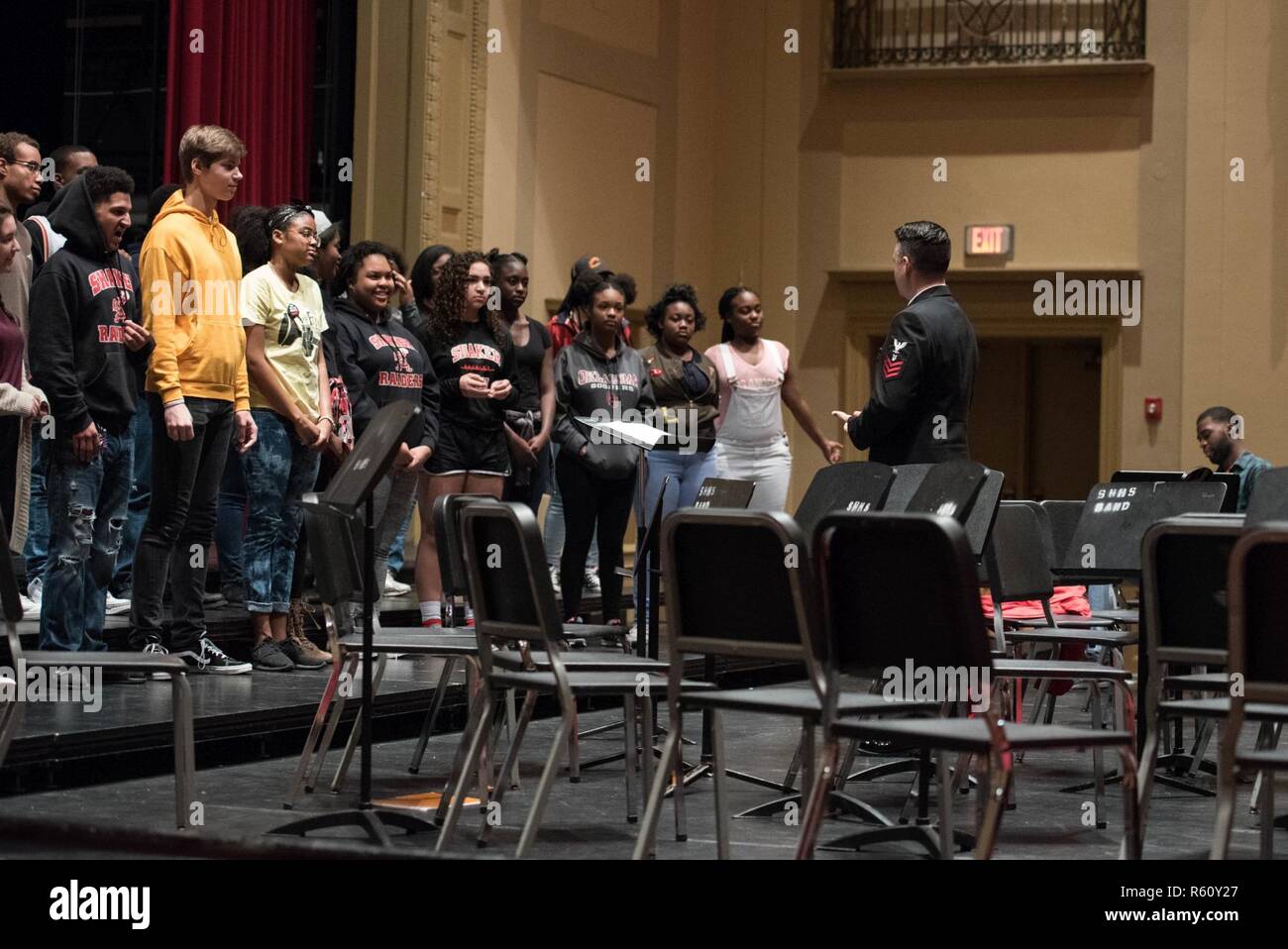 CLEVELAND (April 21, 2017) Musician 1st Class Robert Kurth conducts a masterclass with a choir at Shaker Heights High School. The Sea Chanters are on a 21-day tour of the midwestern United States connecting communities across the United States to their Navy. Stock Photo