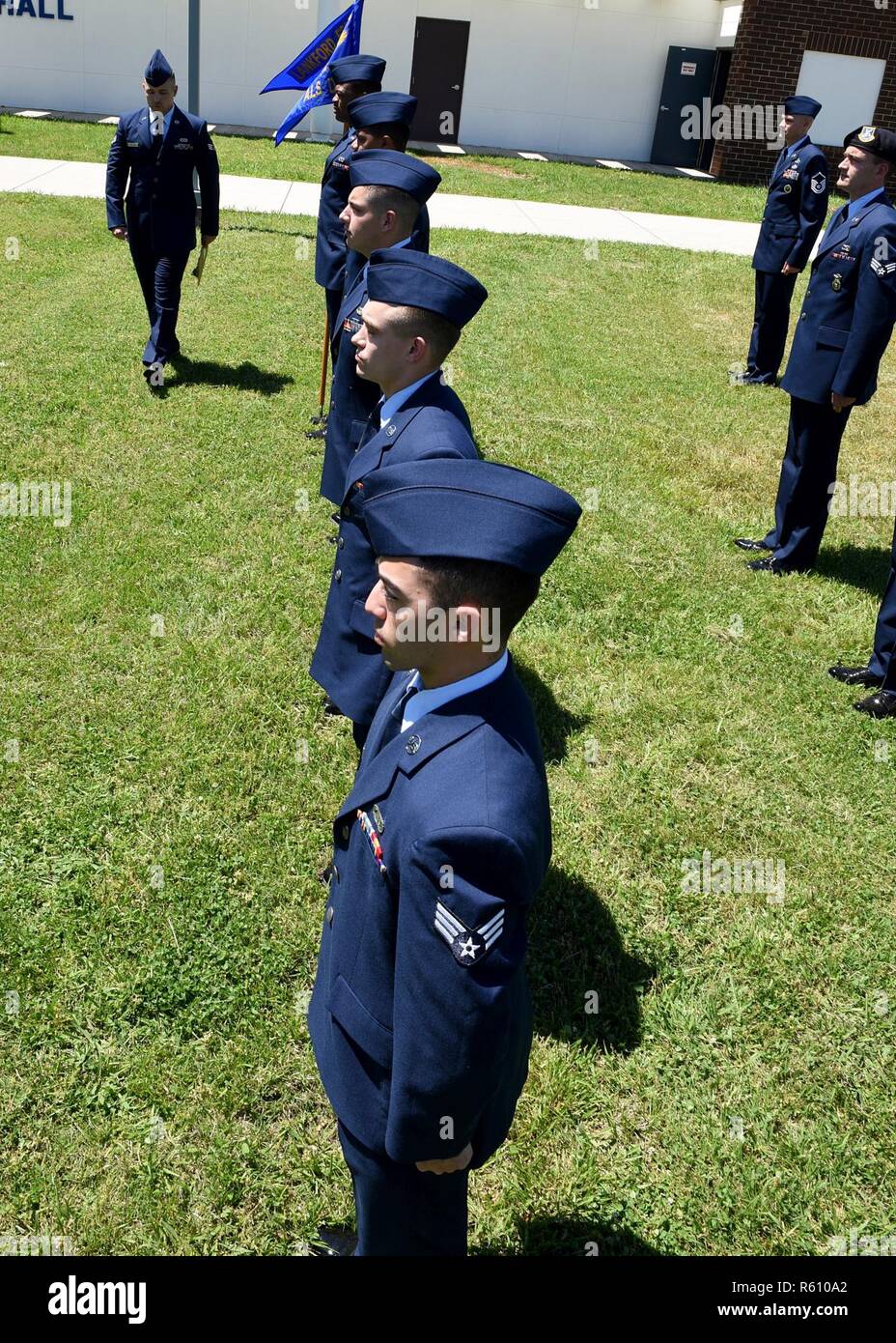 Open Ranks Inspection Guide Airman leadership school students in Class 17-5 stand outdoors for an ...