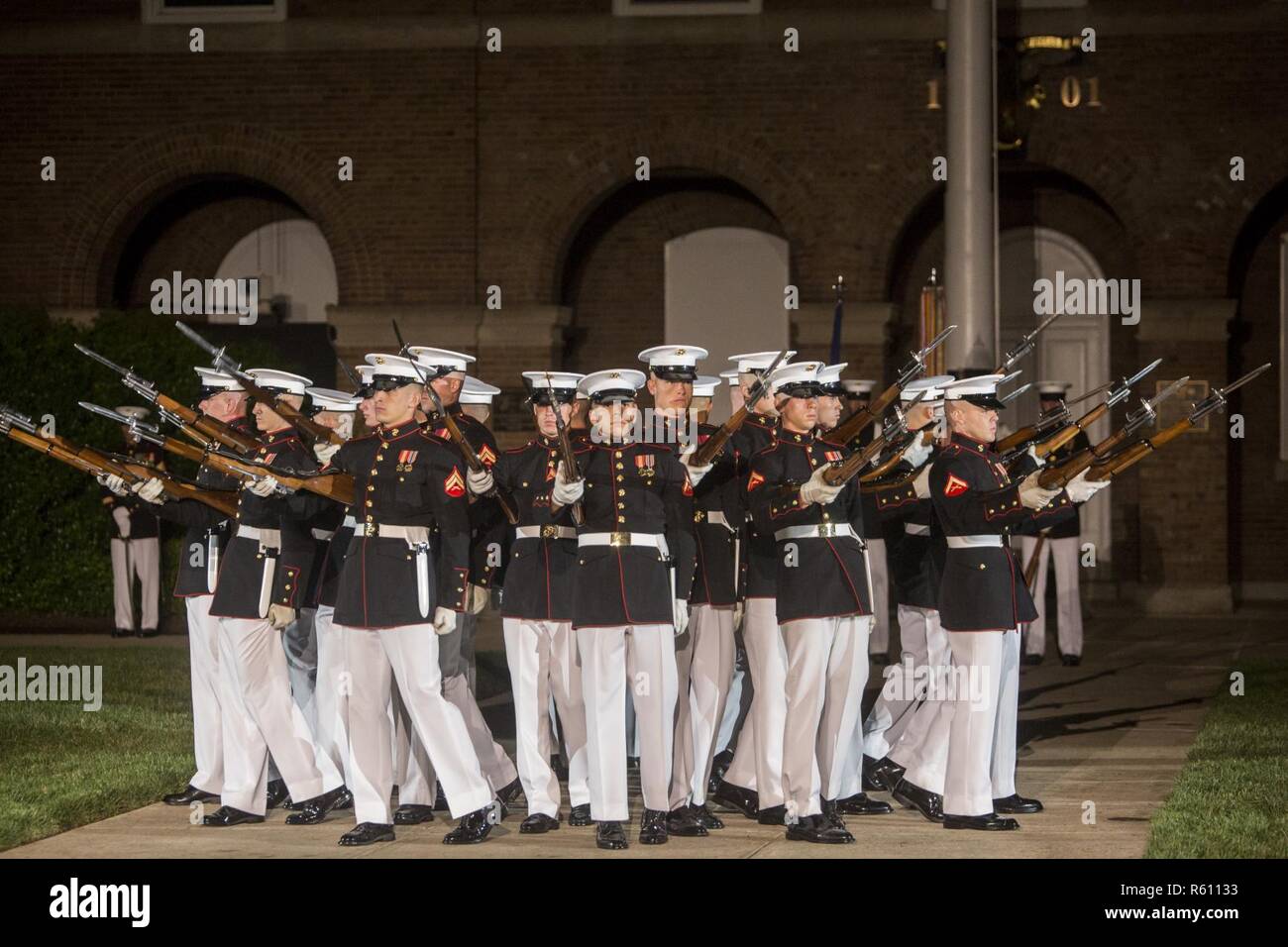 The U.S. Marine Corps Silent Drill Platoon executes the 'bursting bomb ...