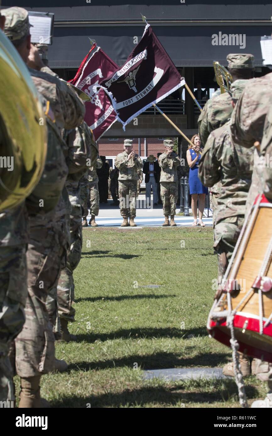 Gen. Robert B. Abrams (left), commanding general of U.S. Army Forces Command, and Maj. Gen. Leopoldo A. Quintas, incoming commanding general of 3rd Infantry Division, applaud during pass and review, May 8, 2017 at the division’s change of command ceremony on Cottrell Field, Fort Stewart, Ga. Maj. Gen. Jim Rainey relinquished command of 3rd ID to Quintas. Stock Photo