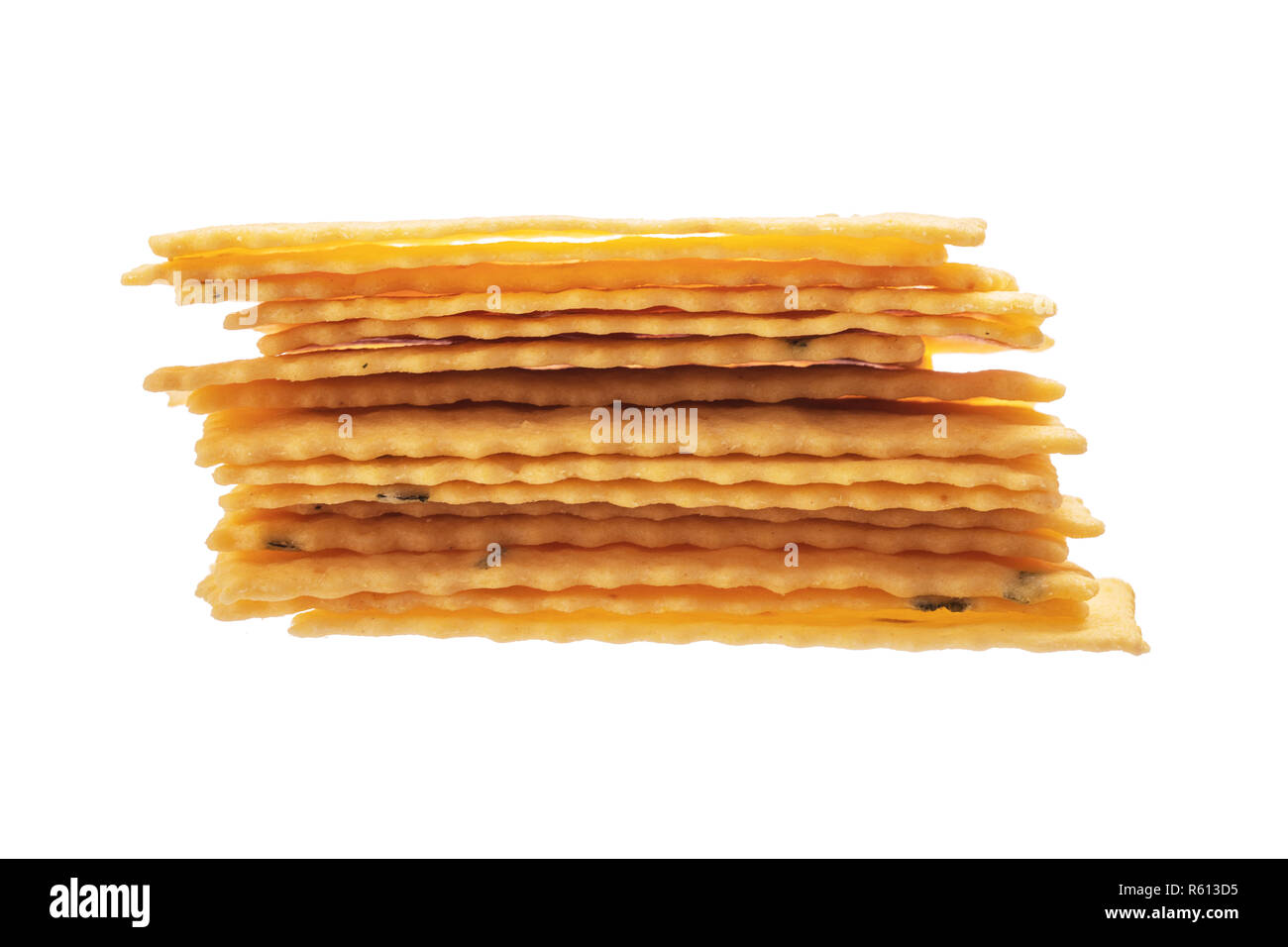 Stack of Cheese thin crackers isolated on white background Stock Photo