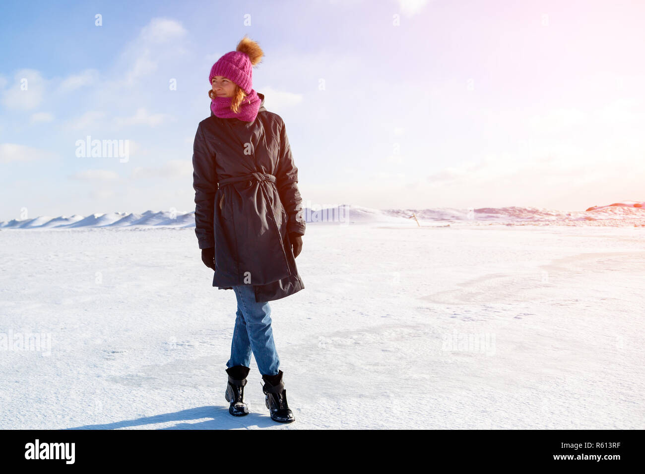 A Young Woman In Warm Coat And Hat Enjoys Winter Nature Walking And Chat On Snow In Frozen Sunny Day In The Background Of A Snow Mountains Blue Stock Photo Alamy A Young Woman In Warm Coat And Hat Enjoys Winter Nature Walking And Chat On Snow In Frozen Sunny Day In The Background Of A Snow Mountains Blue Stock Photo Alamy
