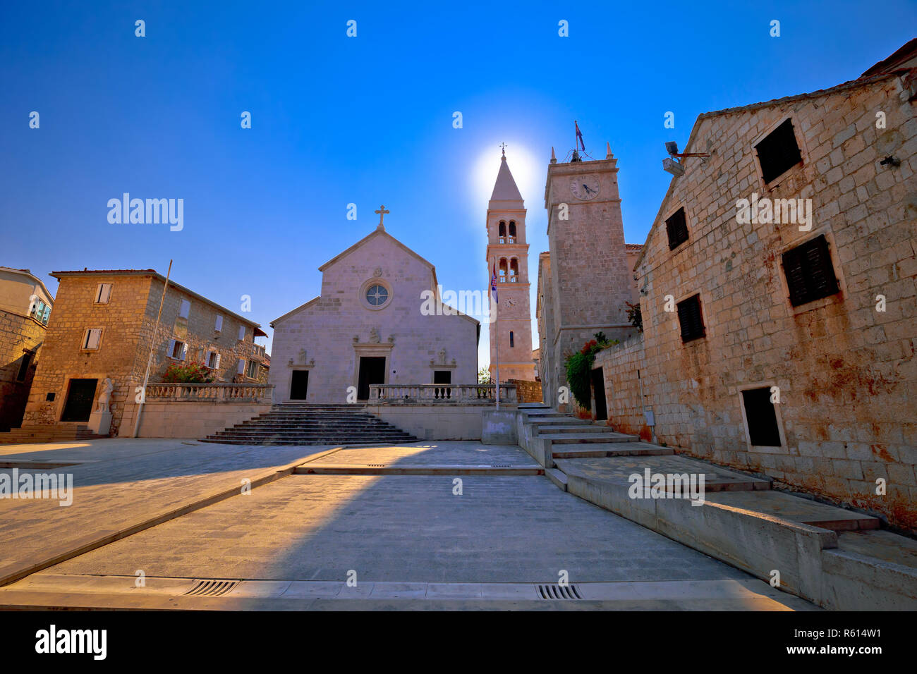 Square and church view in Supetar at sunset Stock Photo