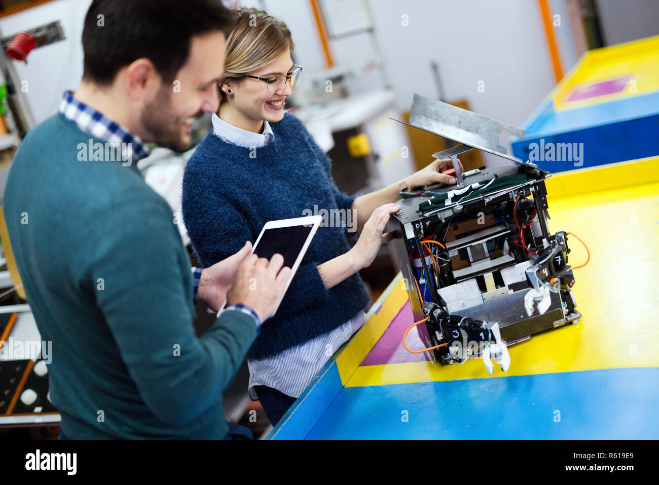 Young students of robotics working on project Stock Photo