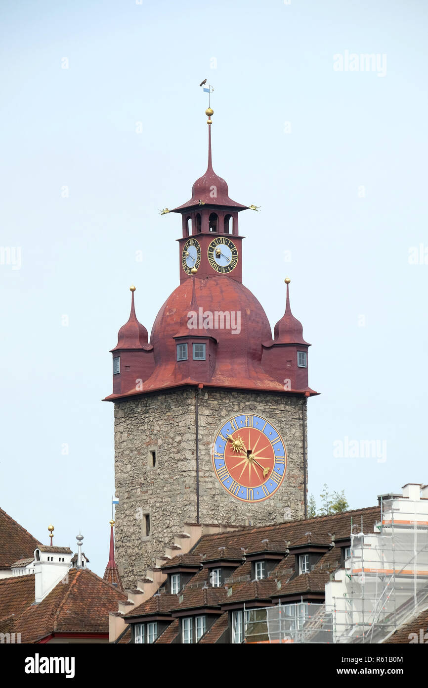 Historical clock tower in old town city Lucerne, Switzerland Stock