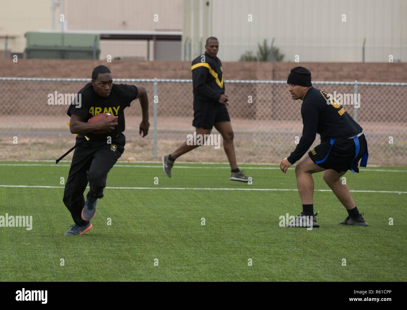 U.S. Military Police and Engineers play flag football on Thanksgiving at  Davis-Monthan Air Force Base, November 22, 2018. U.S. Northern Command is  providing military support to the Department of Homeland Security and