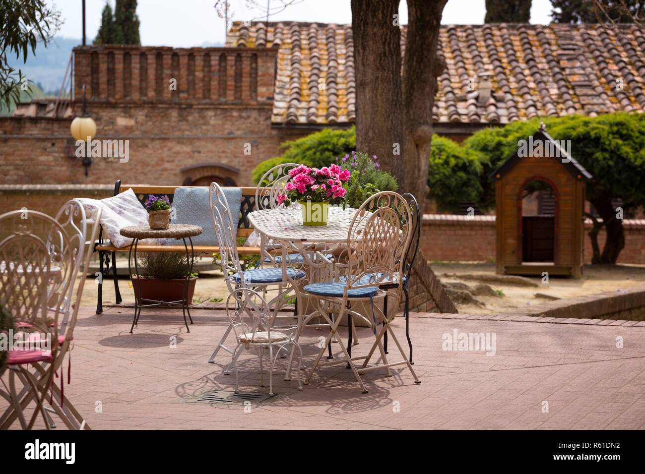 cafe. Small patio. tables and chairs at the city, Italy, Certaldot