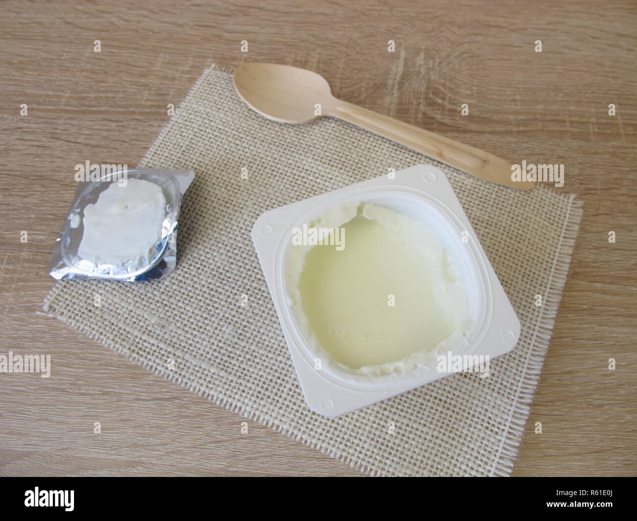 Yogurt In Plastic Cup With Aluminum Lid Stock Photo Alamy