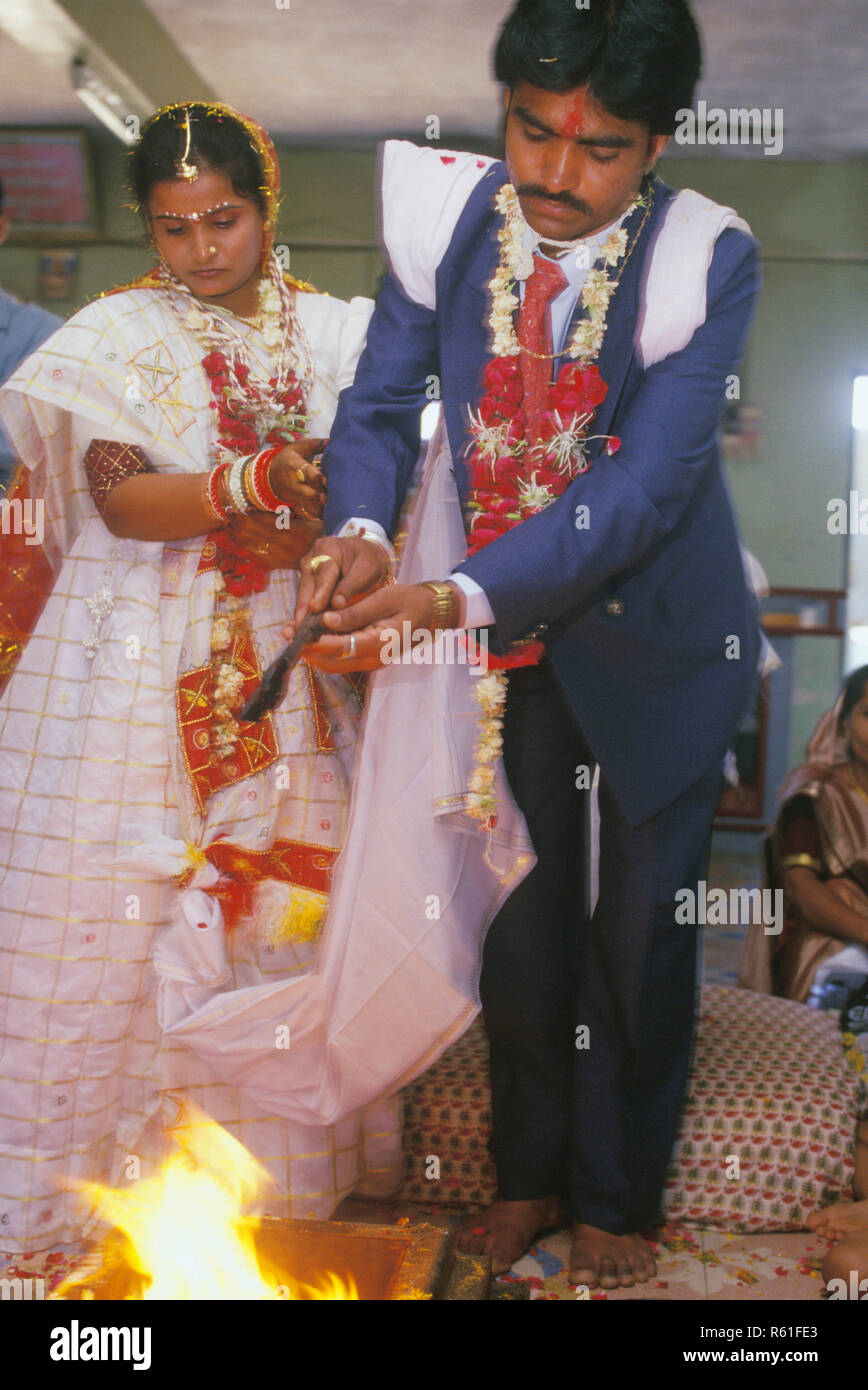 Indian wedding havan ceremony by Gujarati Brahmin couple, India MR#767 Stock Photo