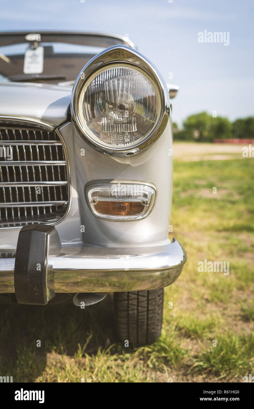PAAREN IM GLIEN, GERMANY - MAY 19, 2018: Fragment of large family car Peugeot 404 SL, 1968. Vintage toning. Die Oldtimer Show 2018. Stock Photo