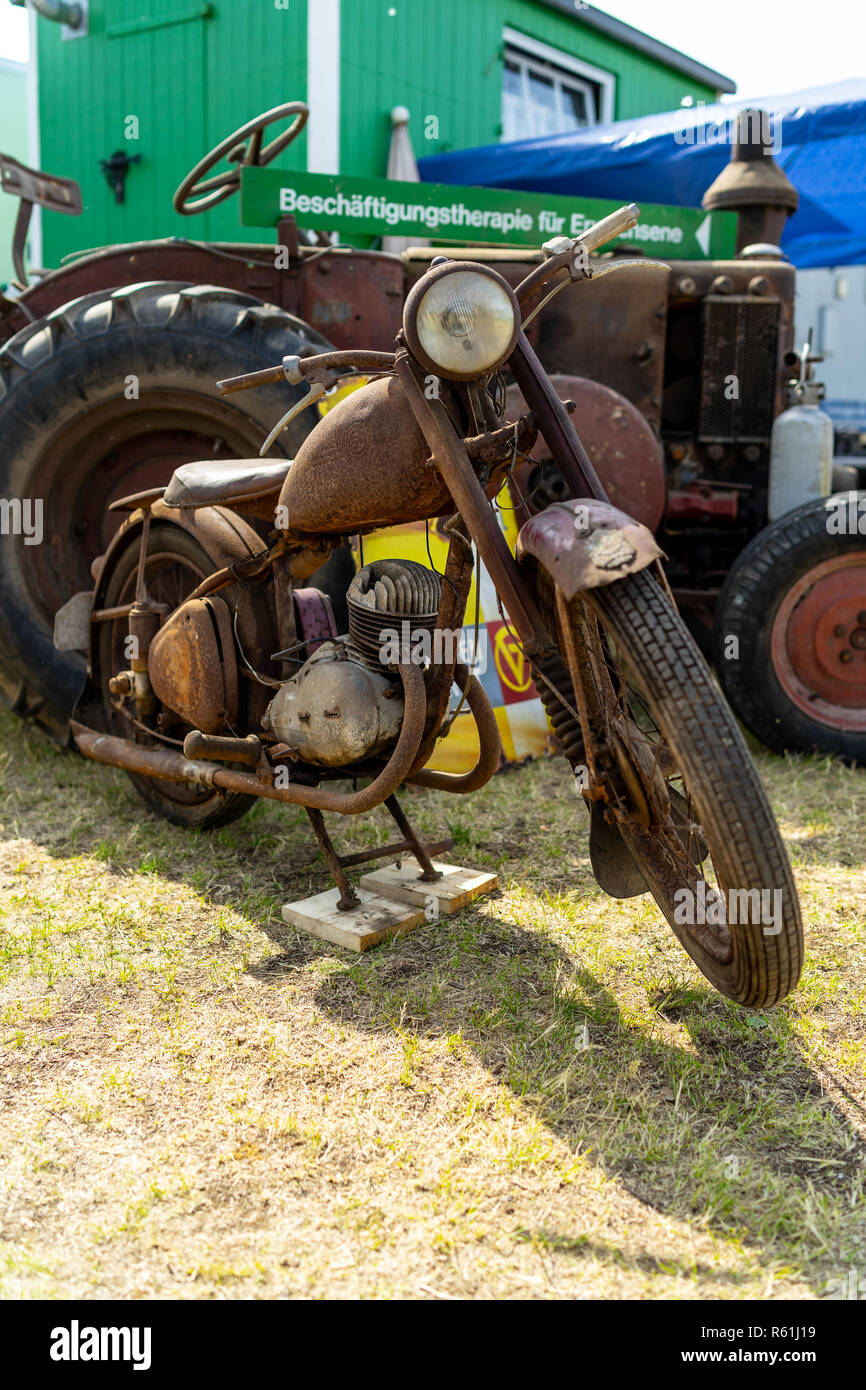 PAAREN IM GLIEN, GERMANY - MAY 19, 2018: Classic motorcycle Royal Enfield Bullet. Poor condition. Exhibition 'Die Oldtimer Show 2018'. Stock Photo
