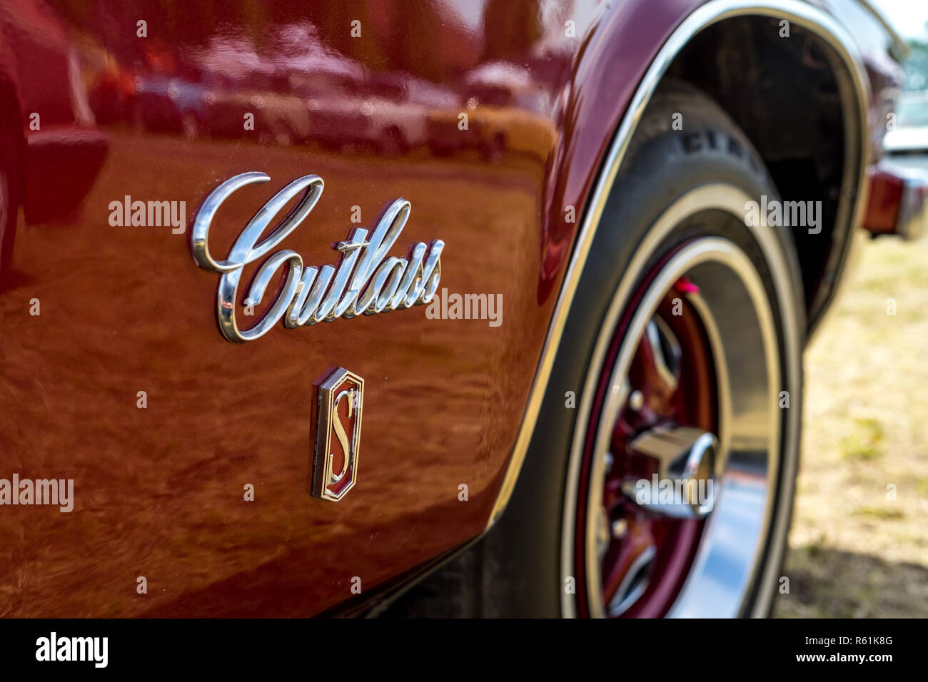 PAAREN IM GLIEN, GERMANY - MAY 19, 2018: Emblem of a mid-size car Oldsmobile Cutlass S, 1973. Die Oldtimer Show 2018. Stock Photo