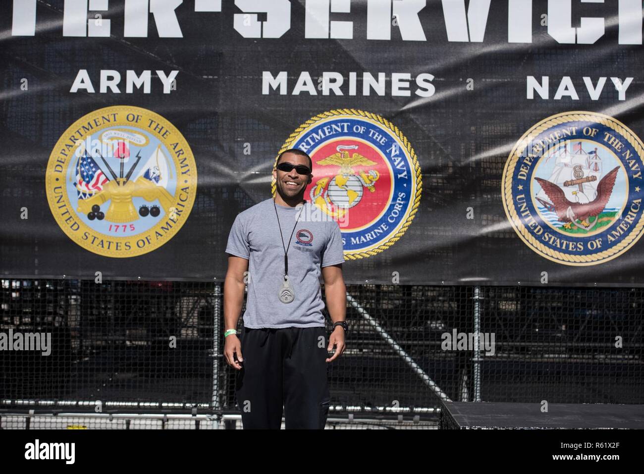 U S Navy Senior Chief Petty Officer Josh Husband Third Place Poses For A Photo After The Air Force Alpha Warrior Competition Nov 16 2018 At The Alpha Warrior Proving Grounds Retama Park