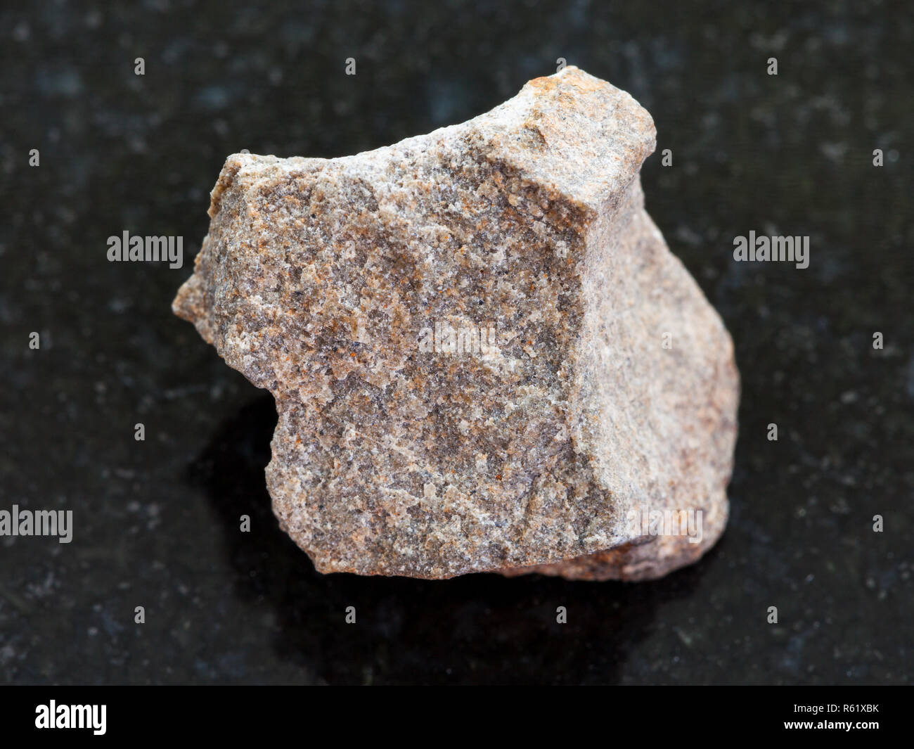 rough Quartzite stone on dark background Stock Photo