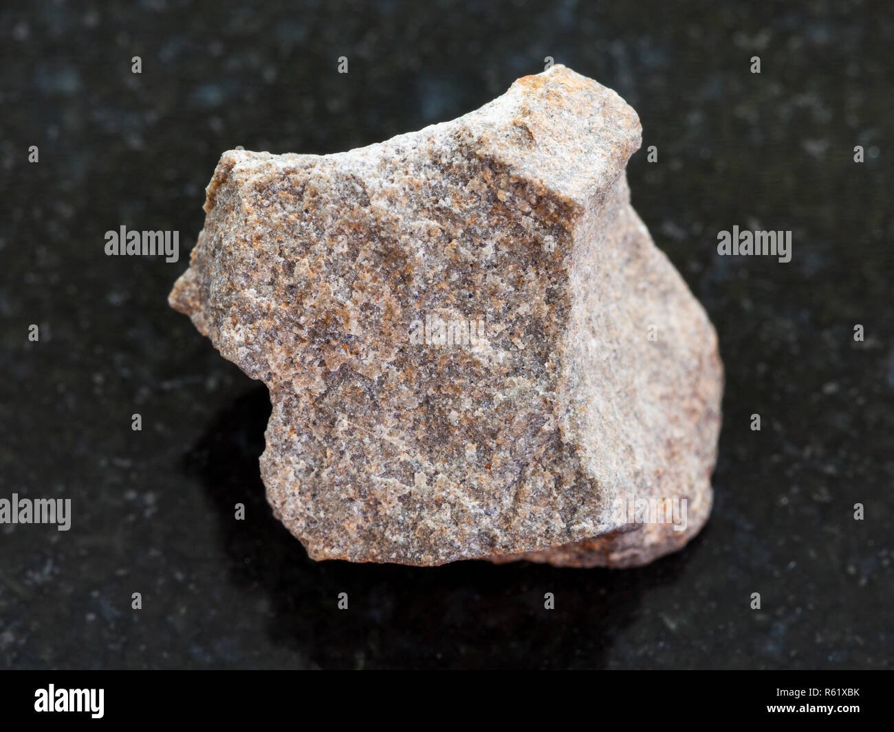 rough Quartzite stone on dark background Stock Photo - Alamy