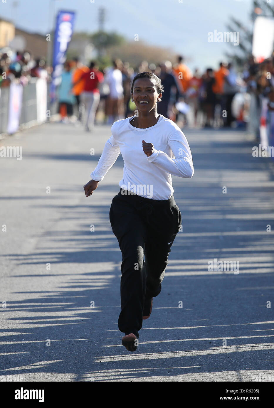 CAPE TOWN, SOUTH AFRICA - Wednesday 25 July 2018, members of the public, school children and residents of Prunus Street, Bonteheuwel, participate in the Western Province Athletics (WPA) Street Athletics programme.  Children of all ages and adults, get to run various distances from 50m to 200m in a closed-off street within a residential area. These events are organised by the WPA Development office and sponsored by the Old Mutual Two Oceans Marathon (OMTOM). Photo by Roger Sedres/ImageSA Stock Photo