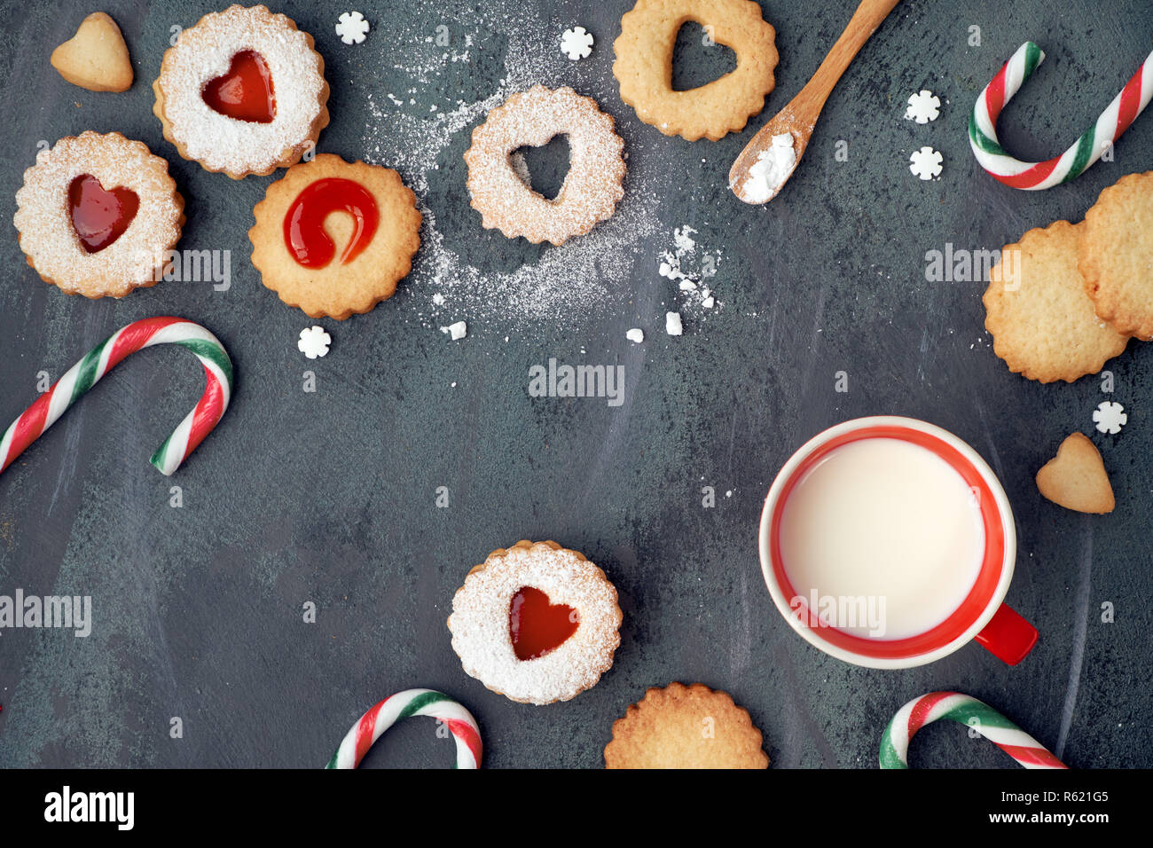 Top View Of Traditional Christmas Linzer Cookies With Strawberry Jam Candy Canes And Milk On Dark Background Stock Photo Alamy