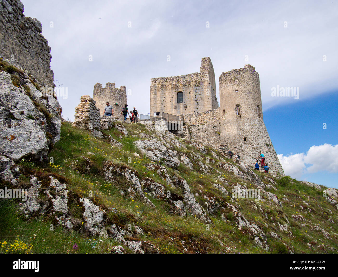 Italy, Abruzzo, Calascio Ruined castle, Rocca Calascio, climbers go up the tower Stock Photo