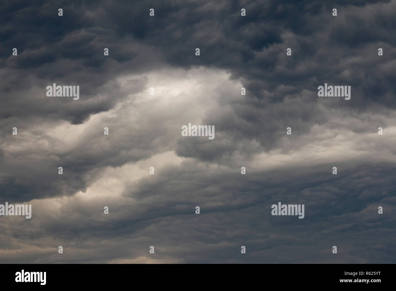 Bizarre Dark Clouds Before The Storm Stock Photo - Alamy
