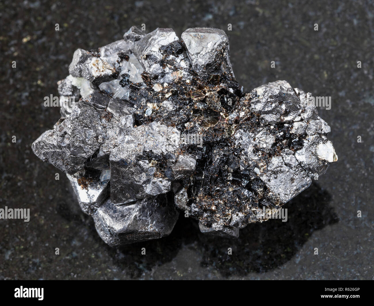 Magnetite Rough rough crystalline Magnetite stone on dark Stock Photo - Alamy
