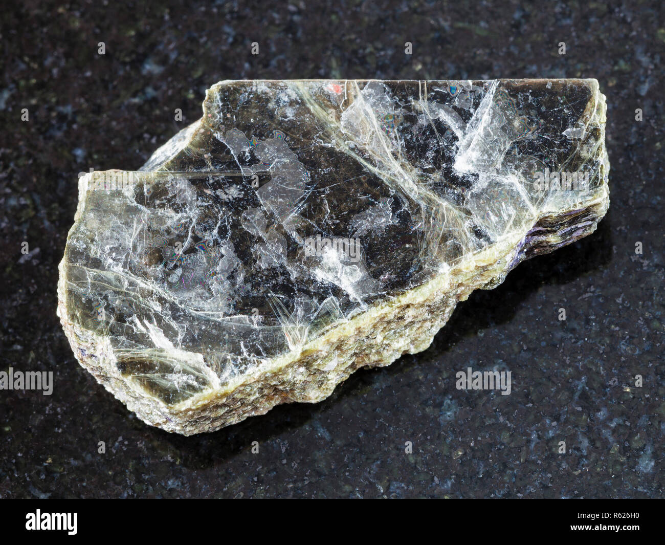 raw muscovite mica stone on dark background Stock Photo Alamy