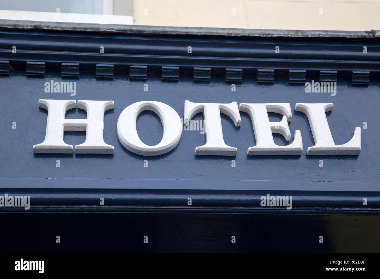 Hotel Sign on Building Wall Stock Photo - Alamy
