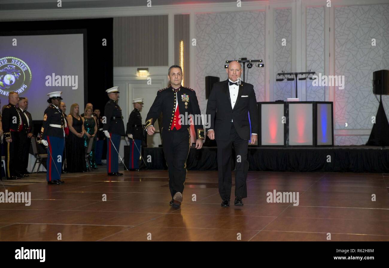 U.S. Marine Corps Lt. Gen. Michael A. Rocco, left, deputy commandant, Manpower and Reserve Affairs (M&RA), and retired Sgt. Maj. Michael P. Barrett, 17th Sergeant Major of the Marine Corps, march during the M&RA birthday ball at The Crystal Gateway Marriott, Arlington, Va., Nov. 16, 2018. Attendees celebrate the Marine Corps birthday with a colors ceremony and traditional cutting of the cake. Stock Photo