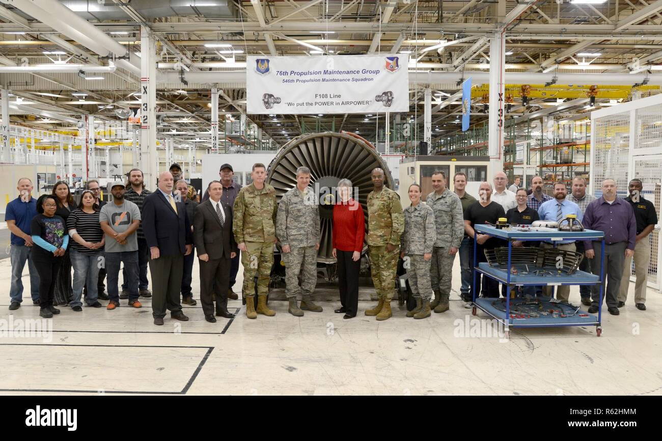 Secretary of the Air Force Heather Wilson, center, was able to thank members of the 76th Propulsion Maintenance Group F108 engine line after learning about their Art of the Possible production success. Wilson is surrounded by senior leadership here as well as workers critical to meeting on-time delivery goals to the customer. Stock Photo