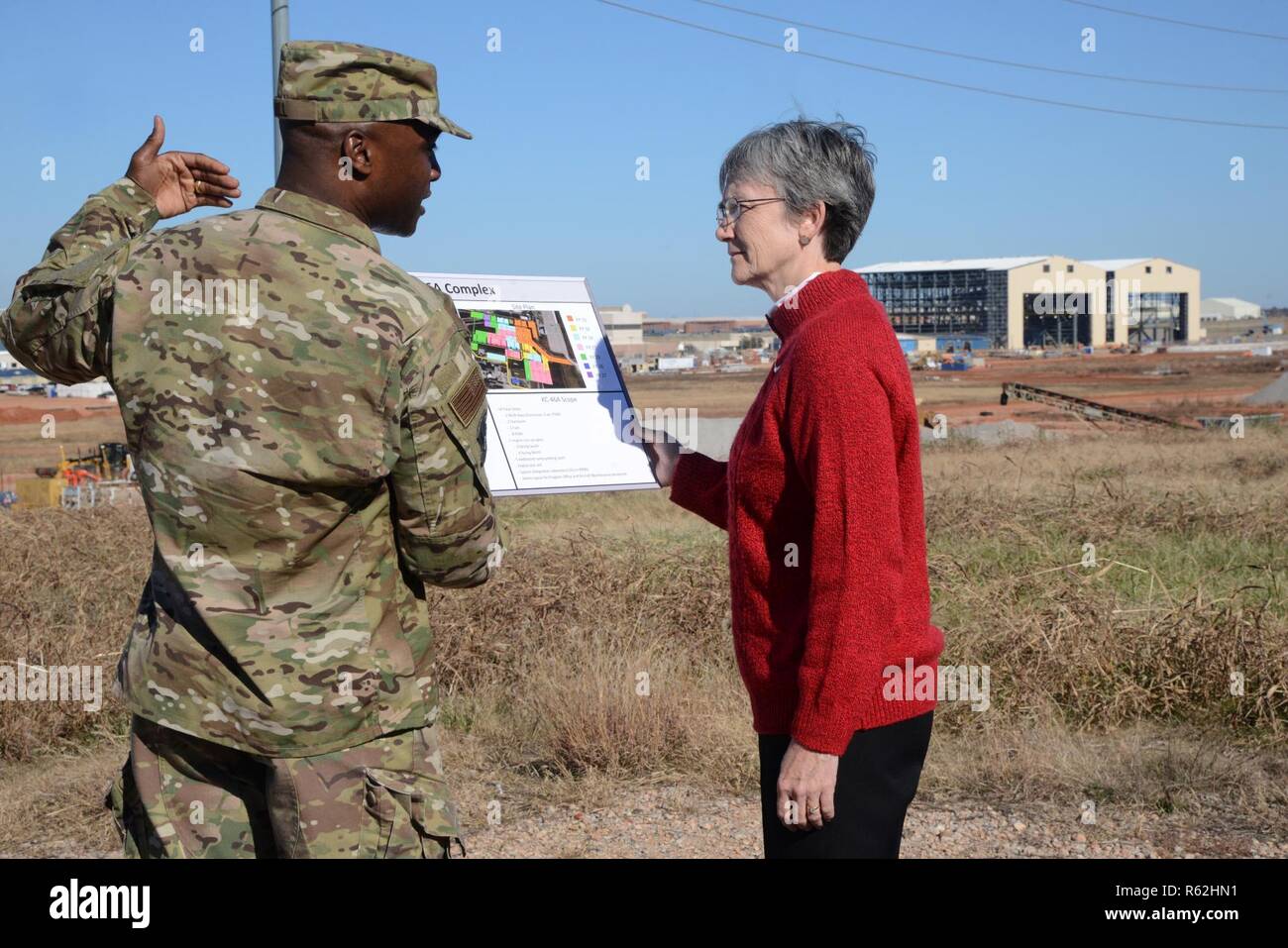Col. Kenyon Bell, 72nd Air Base Wing commander, gives Secretary of the Air Force Heather Wilson, an overview of the KC-46A program and its maintenance campus under construction in the background during her visit to Tinker Air Force Base Nov. 16. This is Wilson’s first visit to Tinker since becoming secretary. Stock Photo