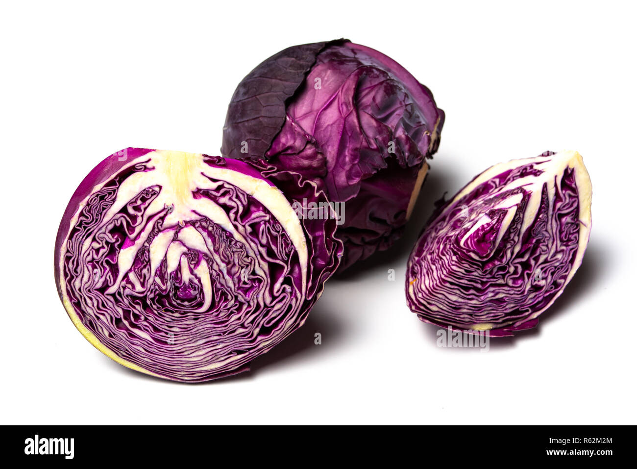 Purple cabbage slices on white table isolated Stock Photo
