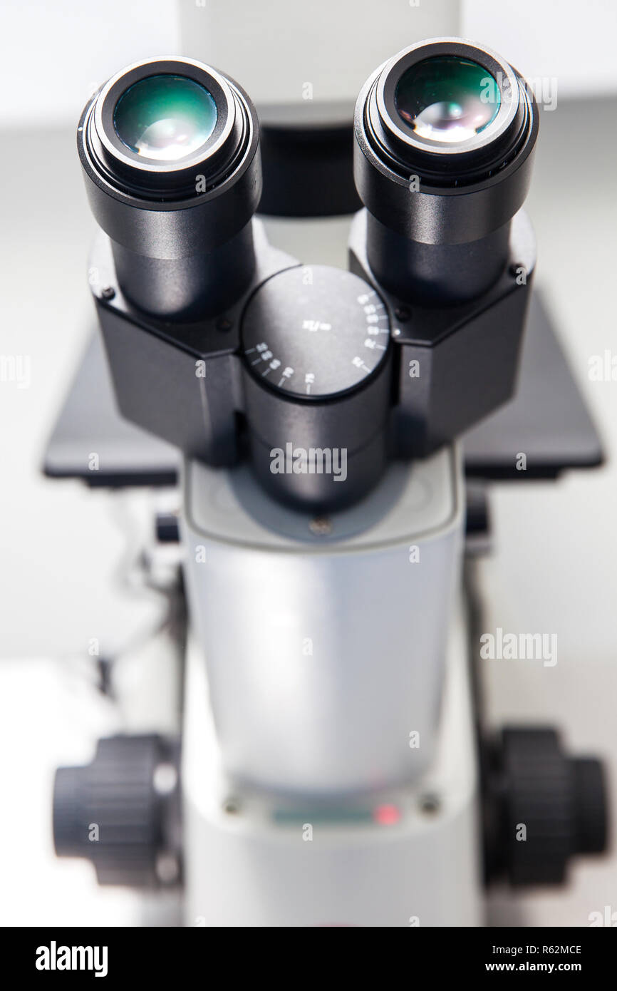 Close up of stereo microscope eyepieces in the laboratory Stock Photo