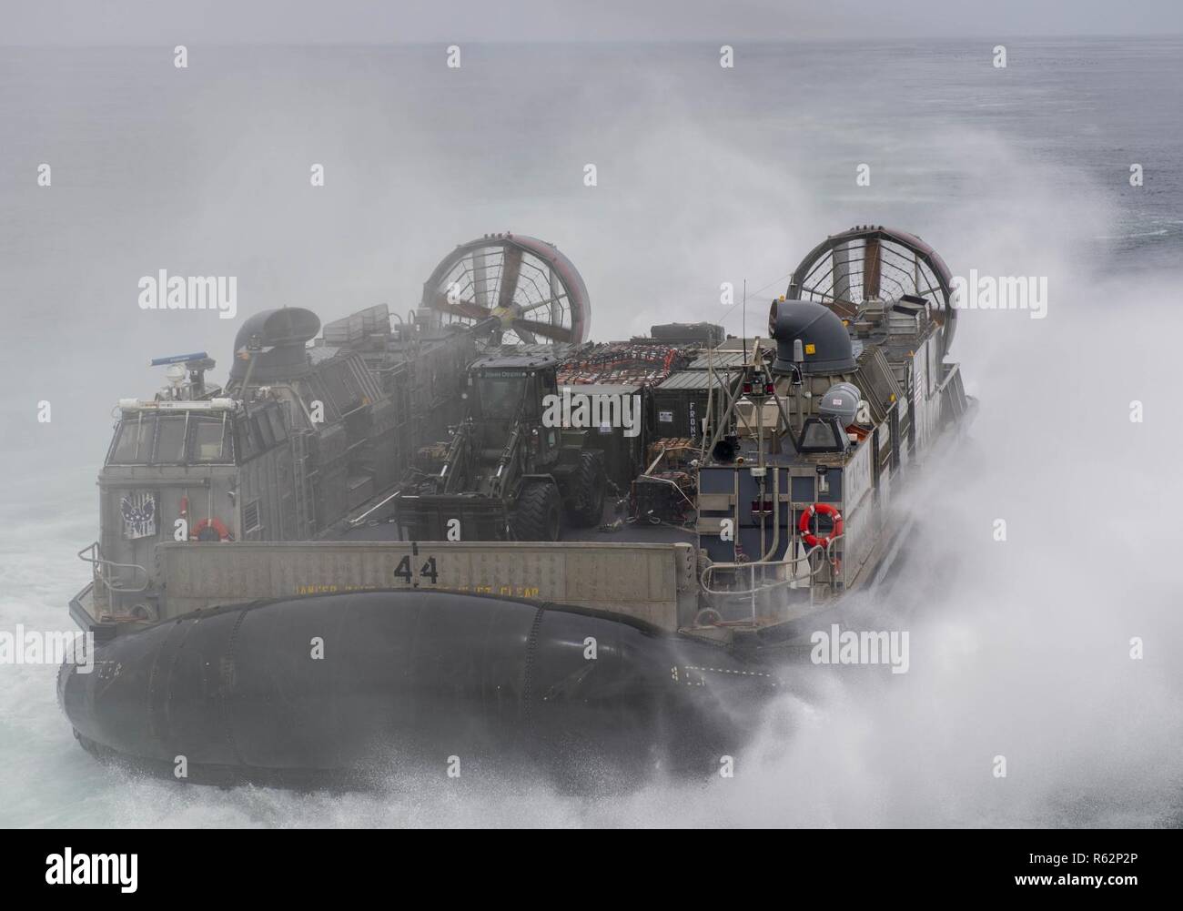 PACIFIC OCEAN (Nov. 22, 2018) A landing craft air cushion (LCAC) disembarks from the San Antonio-class amphibious transport dock ship USS Somerset (LPD 25), Nov. 22, 2018, during a humanitarian assistance and disaster relief exercise in the Pacific Ocean. Somerset is part of Littoral Combat Group One, which is deployed in support of the Enduring Promise Initiative to reaffirm U.S. Southern Command's longstanding commitment to the nations of the Western Hemisphere. Stock Photo