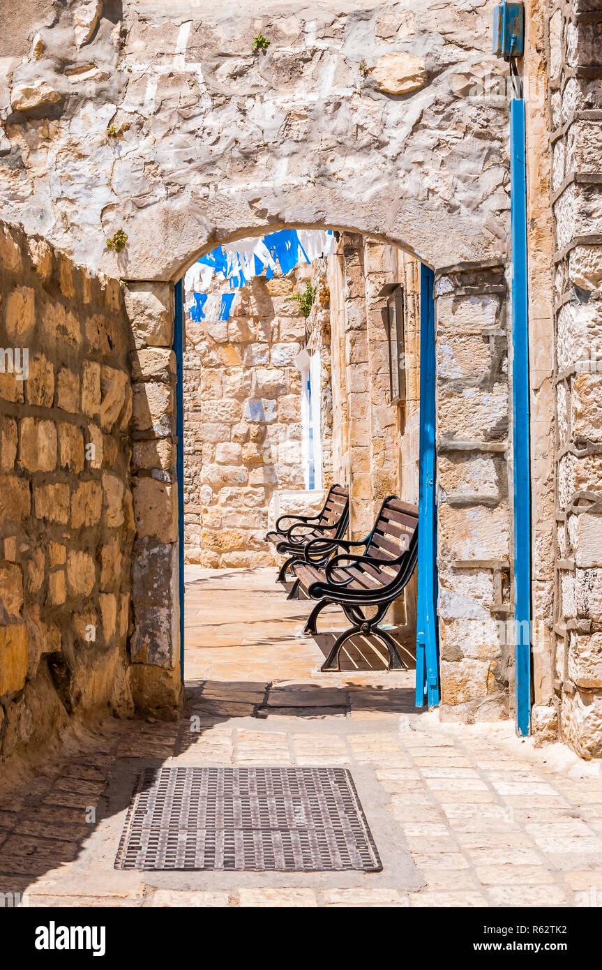 Safed Old Town street, bystreet, alley, backstreet with benches ...