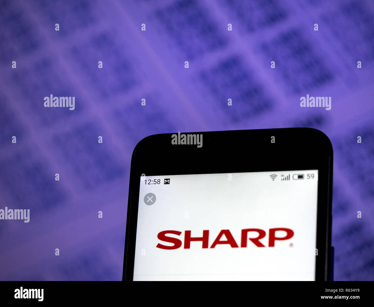 Kiev, Ukraine. 3rd Dec, 2018. Sharp Corporation logo seen displayed on smart phone. Credit: Igor Golovniov/SOPA Images/ZUMA Wire/Alamy Live News Stock Photo